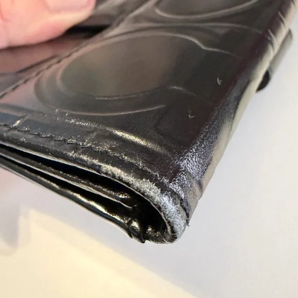 Salvatore Ferragamo Gancini Black Embossed Bifold Leather Wallet